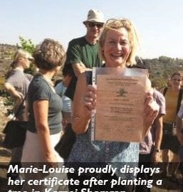 Marie-Louise holding certificate