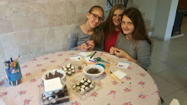 The three most recent immigrant students in the Ofra High School… Shoshana (on the right), from England, Rena, from the United States, and Arella, from France.