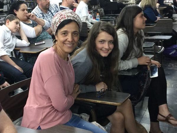 Shoshan with her loving counselor, Yaffa, at a school function.