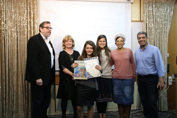 Shoshana, (3rd from the left), receiving the Immigrant of Excellence award, together with her school counselor and ministers of education.