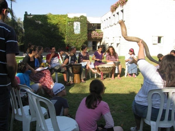 Music therapy on the lawn outside at Heart of Benjamin